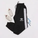شلوار جاگر جیبدار سه خط طرح Adidasکد140403173